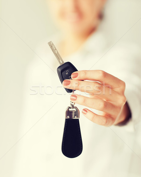 woman hand holding car key Stock photo © dolgachov