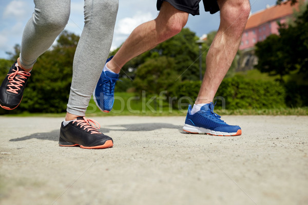 Stock photo: close up of couple running outdoors