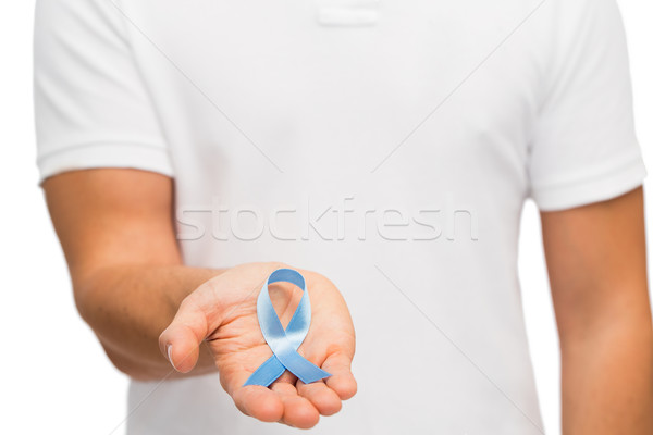 Hand Blauw prostaat kanker bewustzijn lint Stockfoto © dolgachov