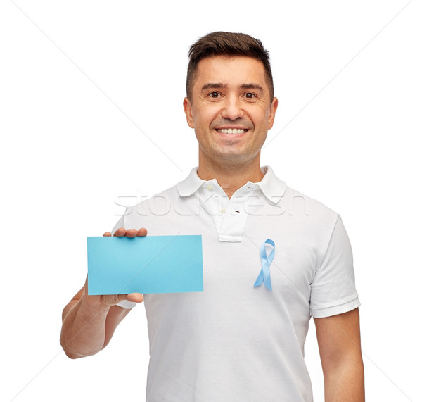 Stock photo: man with prostate cancer awareness ribbon and card