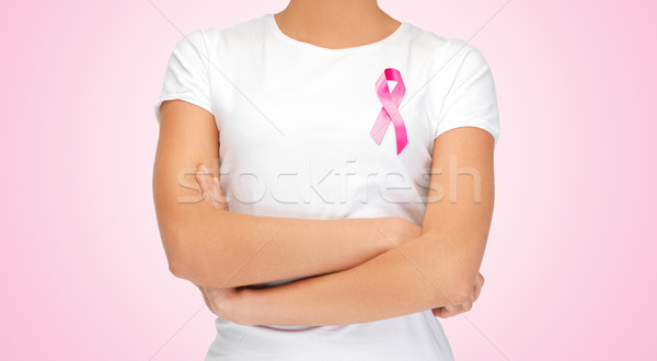 close up of woman with pink cancer awareness ribbon Stock photo © dolgachov