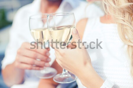 close up of lesbian couple with champagne glasses Stock photo © dolgachov