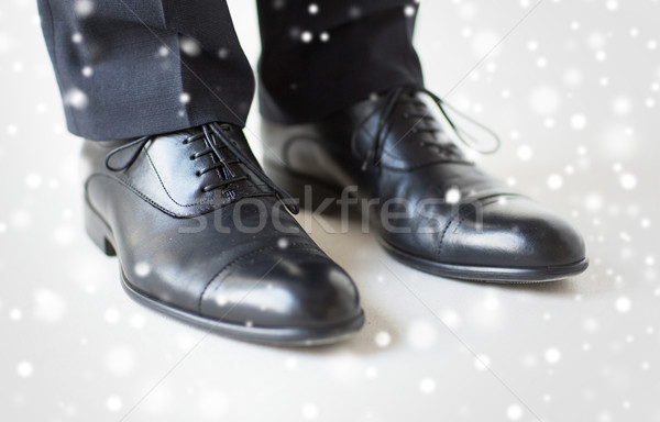close up of man legs in elegant shoes with laces Stock photo © dolgachov