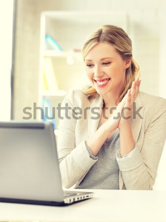 smiling businesswoman calling on smartphone Stock photo © dolgachov