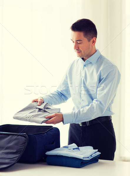 бизнесмен одежды путешествия сумку командировка Сток-фото © dolgachov