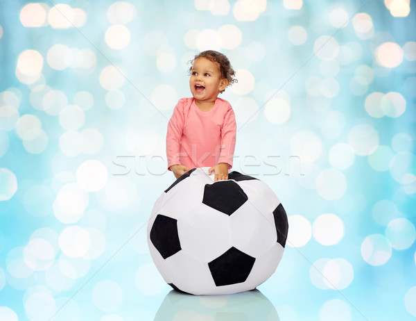 happy mulatto little baby girl playing with ball Stock photo © dolgachov