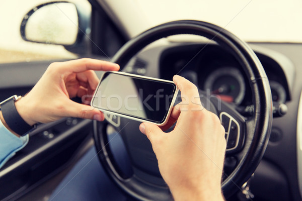 человека стороны смартфон вождения автомобилей Сток-фото © dolgachov