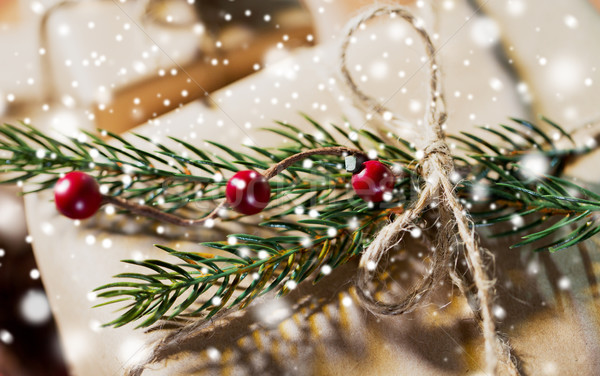 close up of christmas gift with fir branch Stock photo © dolgachov