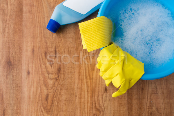 basin with cleaning stuff on wooden background Stock photo © dolgachov
