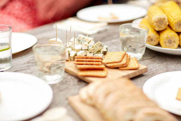 table with food for dinner at summer garden party Stock photo © dolgachov