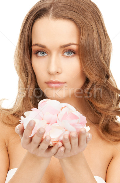 beautiful woman with rose petals Stock photo © dolgachov
