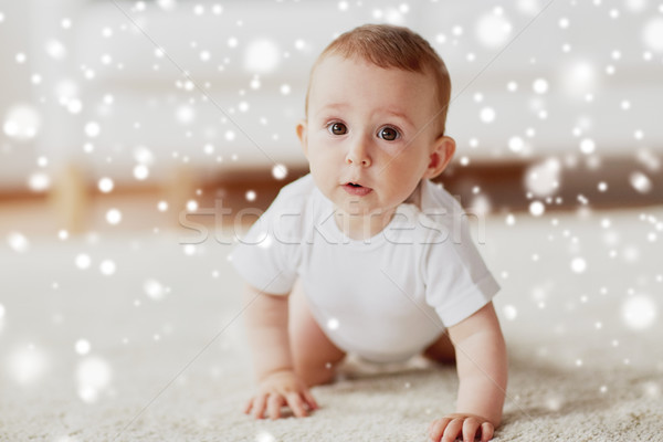 little baby in diaper crawling on floor at home Stock photo © dolgachov