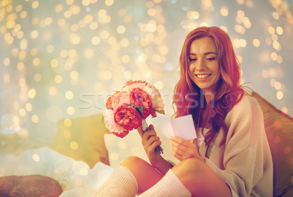 счастливым женщину цветы домой праздников Сток-фото © dolgachov