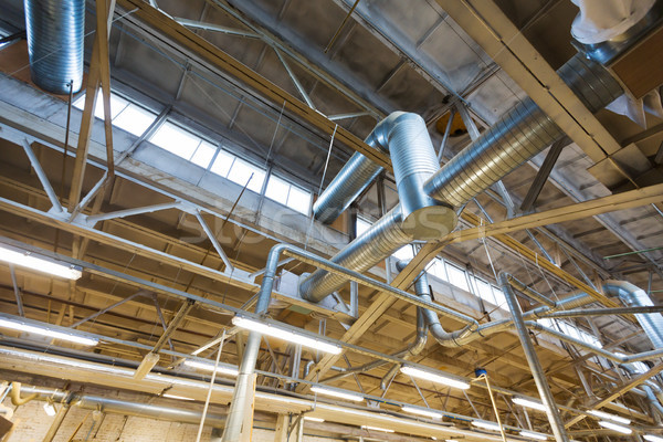 ventilation pipes at factory shop Stock photo © dolgachov