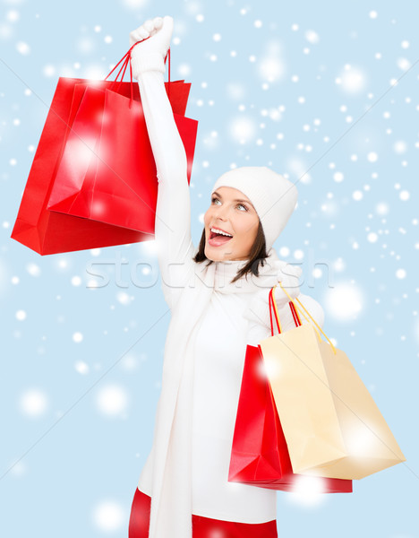 picture of happy woman with shopping bags Stock photo © dolgachov