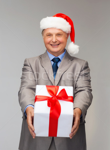 Uśmiechnięty człowiek garnitur Święty mikołaj pomocnik hat Zdjęcia stock © dolgachov