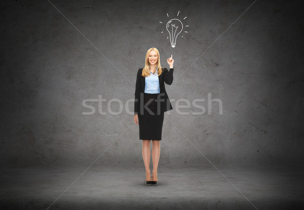 Foto stock: Atractivo · jóvenes · mujer · de · negocios · dedo · hasta · negocios