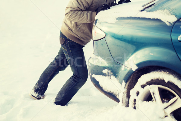 Közelkép férfi toló autó leragasztott hó Stock fotó © dolgachov