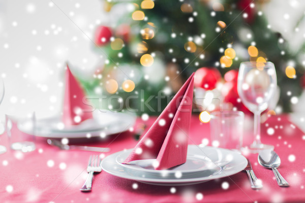 room with christmas tree and decorated table Stock photo © dolgachov