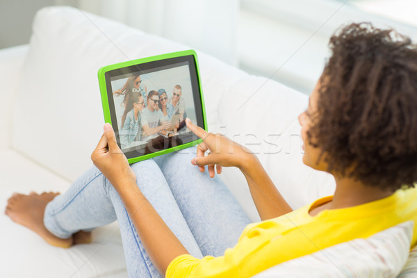 happy african american woman with tablet pc Stock photo © dolgachov