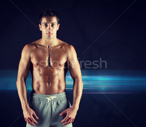 Genç erkek vücut geliştirmeci çıplak kas gövde Stok fotoğraf © dolgachov