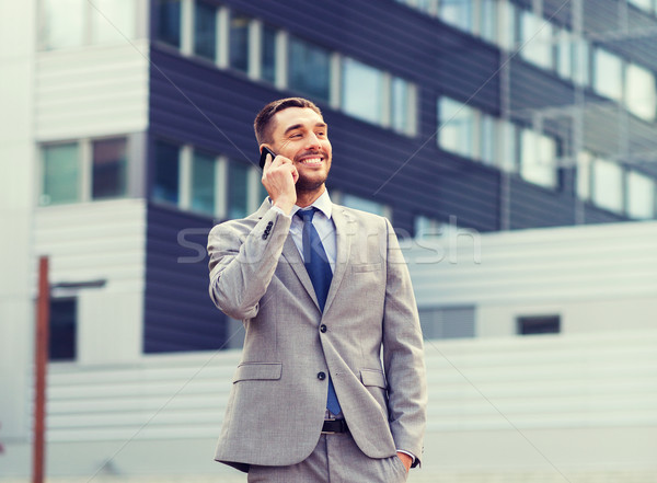 Foto stock: Sorridente · empresário · ao · ar · livre · negócio · tecnologia