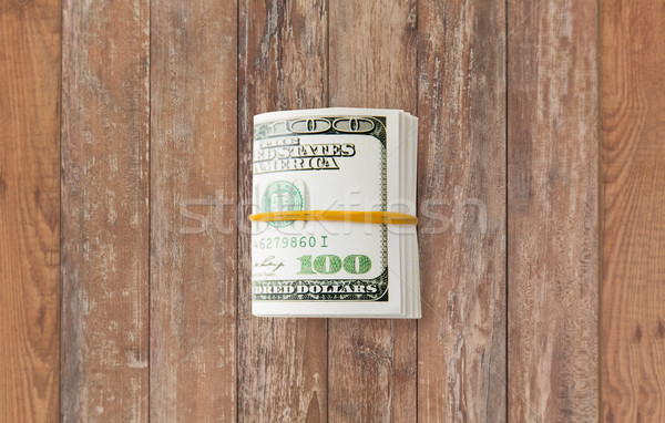 close uop of dollar money packet tied with rubber Stock photo © dolgachov