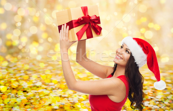 beautiful sexy woman in santa hat with gift box Stock photo © dolgachov