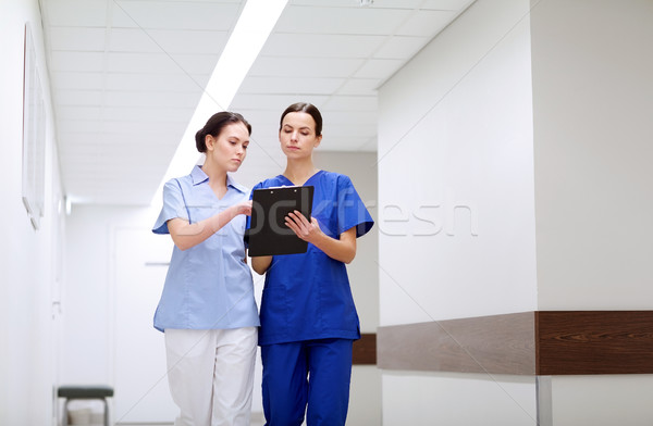 Zwei Krankenschwestern Krankenhaus Zwischenablage Klinik Beruf Stock foto © dolgachov