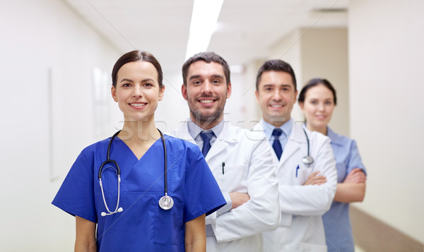 Groupe heureux médecins hôpital clinique profession [[stock_photo]] © dolgachov