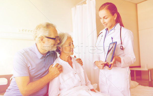 senior woman and doctor with tablet pc at hospital Stock photo © dolgachov