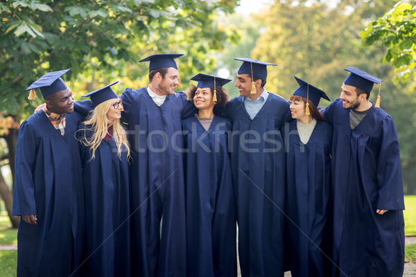Felice studenti scapoli istruzione laurea persone Foto d'archivio © dolgachov