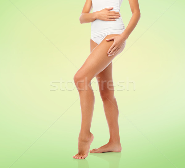 legs of beautiful young woman in white underwear Stock photo © dolgachov