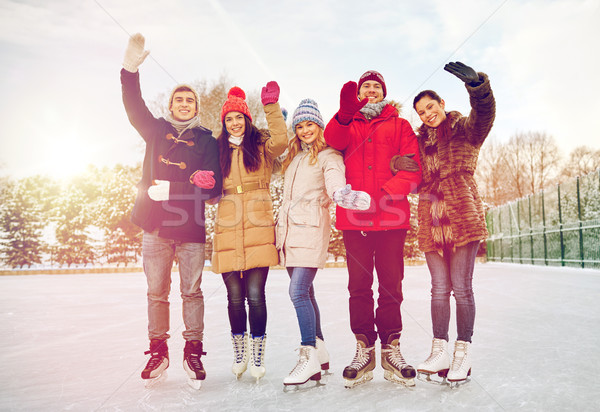 Сток-фото: счастливым · друзей · катание · на · коньках · улице · люди