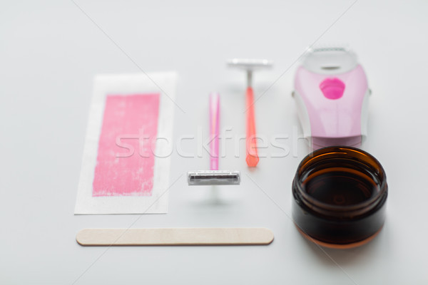 safety razor, epilator, hair removal wax and patch Stock photo © dolgachov