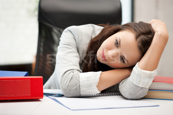 bored and tired woman behid the table Stock photo © dolgachov