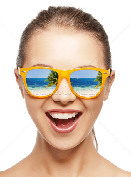 amazed girl in shades Stock photo © dolgachov