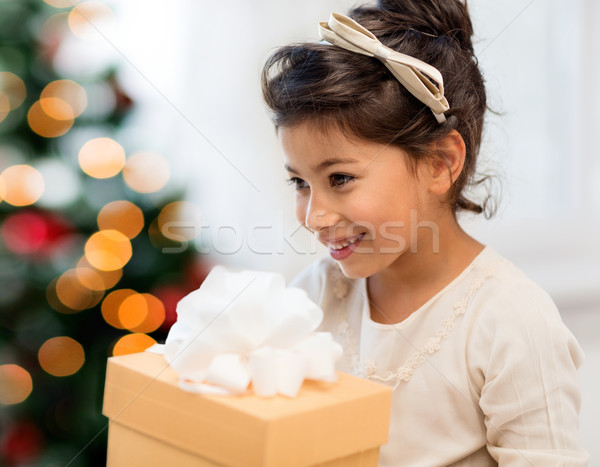 happy child girl with gift box Stock photo © dolgachov