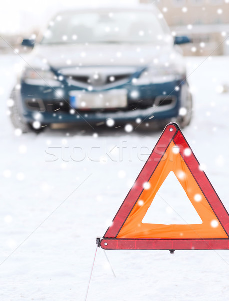 closeup of warning triangle and car Stock photo © dolgachov