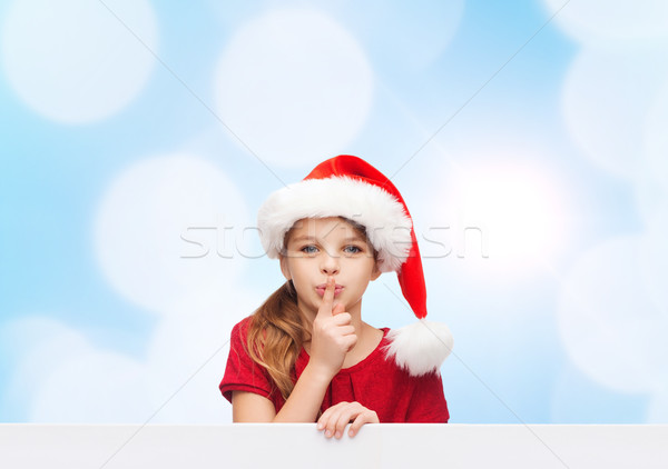 Souriant petite fille helper chapeau Noël Photo stock © dolgachov