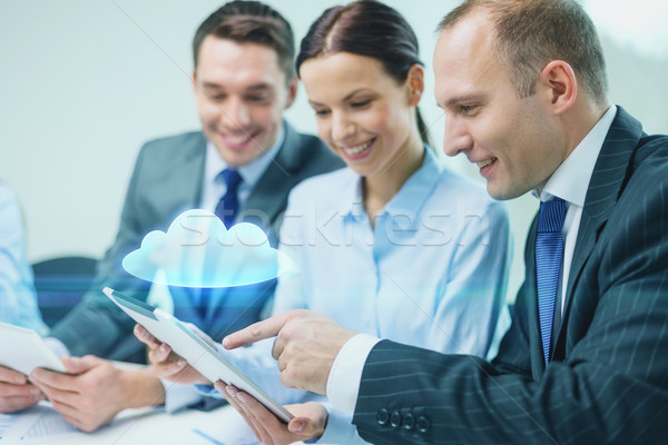 business team with tablet pc having discussion Stock photo © dolgachov
