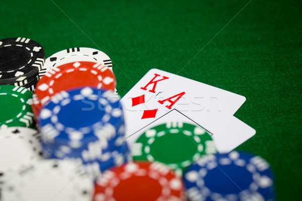 close up of casino chips and playing cards Stock photo © dolgachov