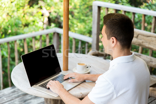 Közelkép üzletember laptop terasz üzletemberek technológia Stock fotó © dolgachov