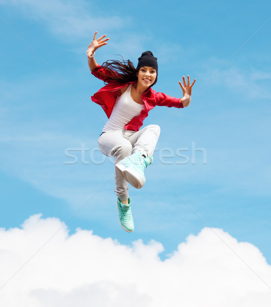 beautiful dancing girl jumping Stock photo © dolgachov
