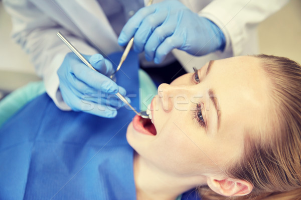 Zdjęcia stock: Dentysta · kobiet · pacjenta · zęby · ludzi