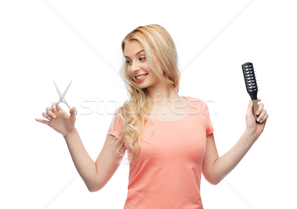 Młoda kobieta nożyczki szczotka do włosów pielęgnacja włosów fryzura piękna Zdjęcia stock © dolgachov