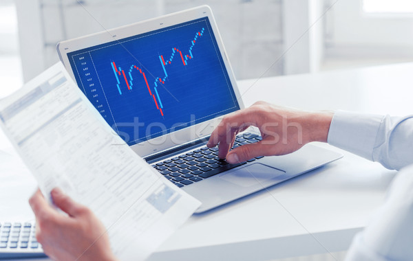 businessman working with forex chart in office Stock photo © dolgachov