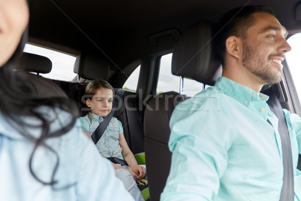 happy family with little child driving in car Stock photo © dolgachov