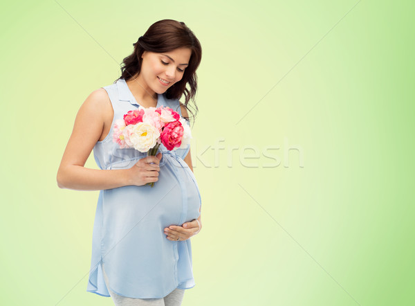Foto stock: Feliz · mulher · grávida · flores · tocante · barriga · gravidez