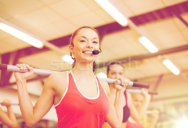 Grupo sorridente pessoas que trabalham fora fitness esportes Foto stock © dolgachov